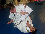 Armbar to Reverse Roll Guard Sweep 7