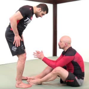 Opponent Using the Butterfly Guard to Make His Legs Safer Against Leglocks