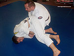 Armbar to Reverse Roll Guard Sweep 10