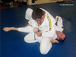 Armbar to Reverse Roll Guard Sweep 11