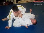 Armbar to Reverse Roll Guard Sweep 12