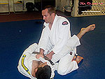 Armbar to Reverse Roll Guard Sweep 3