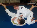 Armbar to Reverse Roll Guard Sweep 4