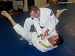 Armbar to Reverse Roll Guard Sweep 5