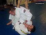 Armbar to Reverse Roll Guard Sweep 6