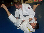 Armbar to Reverse Roll Guard Sweep 8