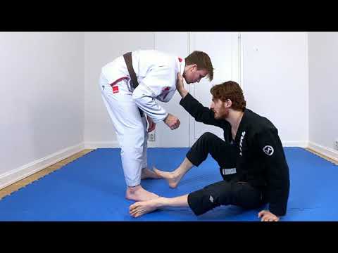 The Collar Drag, One of the Fastest Reversals from the Guard, by Jon Thomas