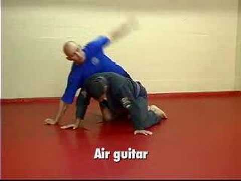 The 'Air Guitar' Finish to a Back Climb from the Half Guard