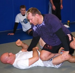 Erik Paulson teaching at an MMA Seminar