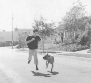 Bruce Lee Running with Dog