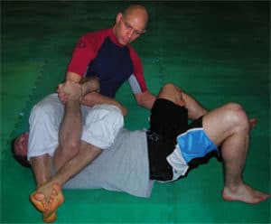 Armbar, lower hand holding leg