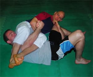 Armbar, lower arm hooking leg