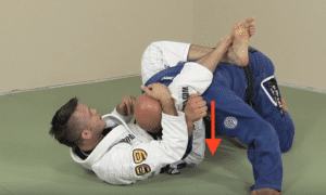 half guard triangle choke - arm moved across