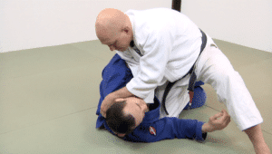 Brabo choke inside the half guard with the lapel of your opponent