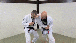 Double leg takedown from the across-the-back and then 2-on-1 grip