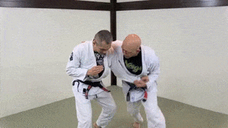 Double leg takedown from the across-the-back and then 2-on-1 grip