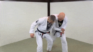Single leg takedown from the across-the-back grip
