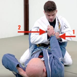 Cross Lapel Grip Break Step 2: Secure the Wrist Above Your Sleeve Grip