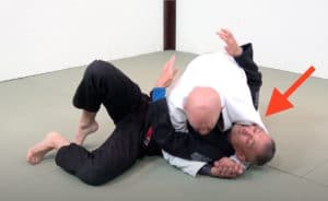 Crossface pressure with the top arm from side control