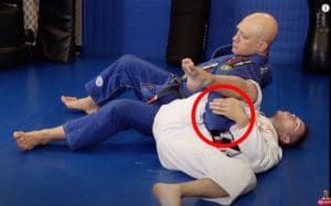 Rolling Omoplata Counter 6 - Control His Elbow With Your Other Hand
