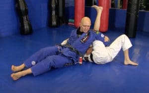 Rolling Omoplata Counter 9 Straighten Your Leg And Prepare to Kick