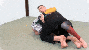 Arm drag followup - Weave your right foot over his right ankle...