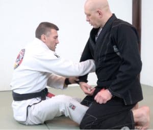 Rob Biernacki attacking with the arm drag in the gi