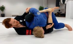 The Closed Guard System - Overhook Attack - Hooking Far Arm with Leg