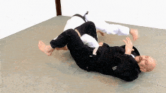 Rolling omoplata escape countered by a brief inversion