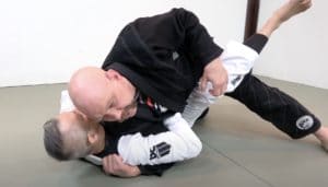 Defending the back take with the collar grip