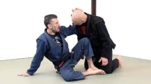 Volume 3 of BJJ for Old F***s has a very extensive low-energy guard retention system