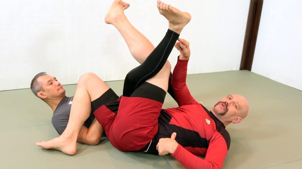 BJJ black belt Stephan Kesting demonstrating how everyone can use rolling backtakes