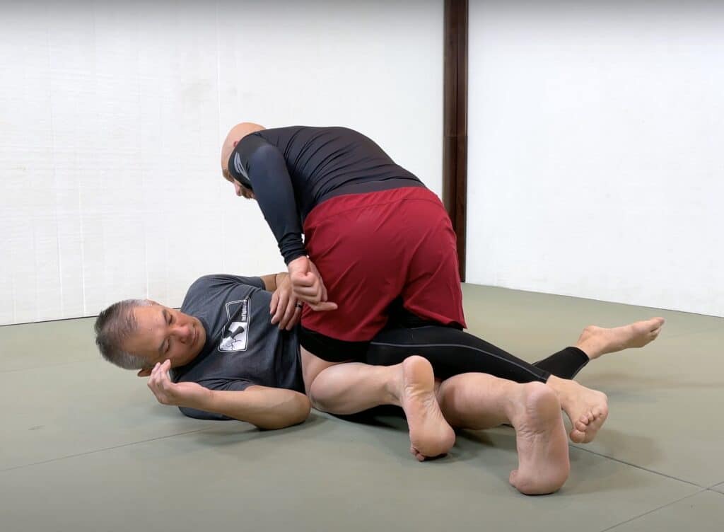 Dope Mount Step 2, Your Front Knee Comes to Your Opponent's Belly